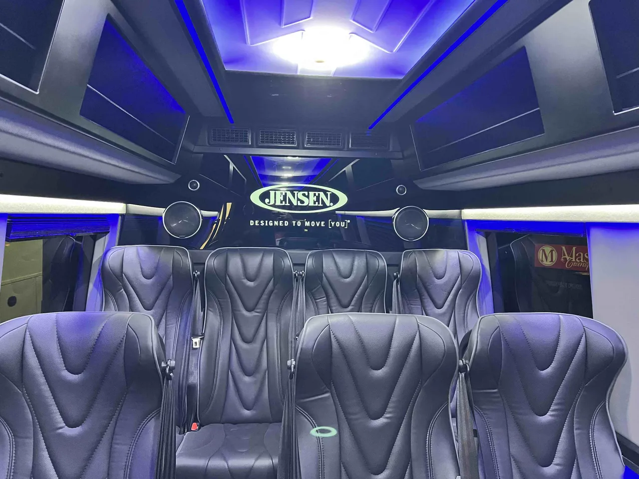 2024 Mercedes Exec Sprinter 14 Pax interior with captain's chairs, LED accent lighting and LED ceiling lighting for minibus rental