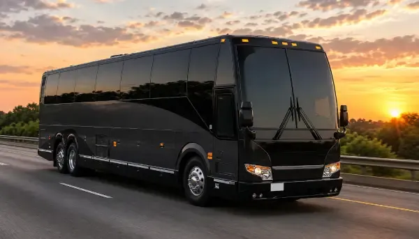 55 Passenger Motor Coach in black, available to rent