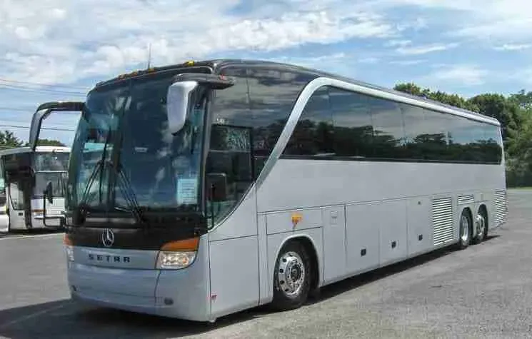White 56 Passenger Setra for charter bus rental