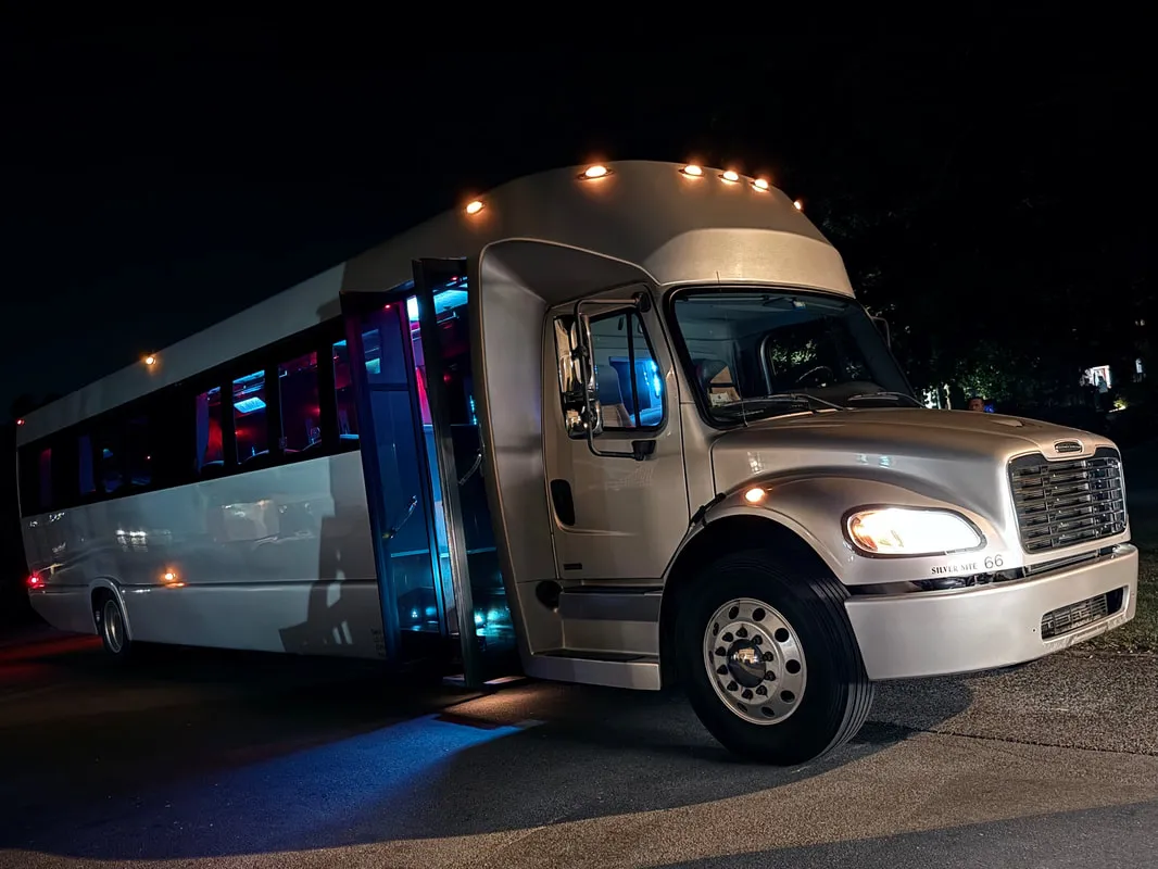 Silver Freightliner Party Bus exterior for party bus rental