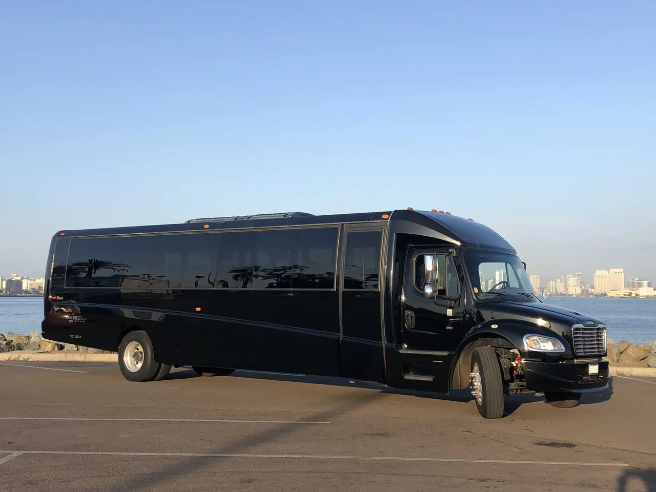 Black Executive Mini-Coach with tinted windows for minibus rental