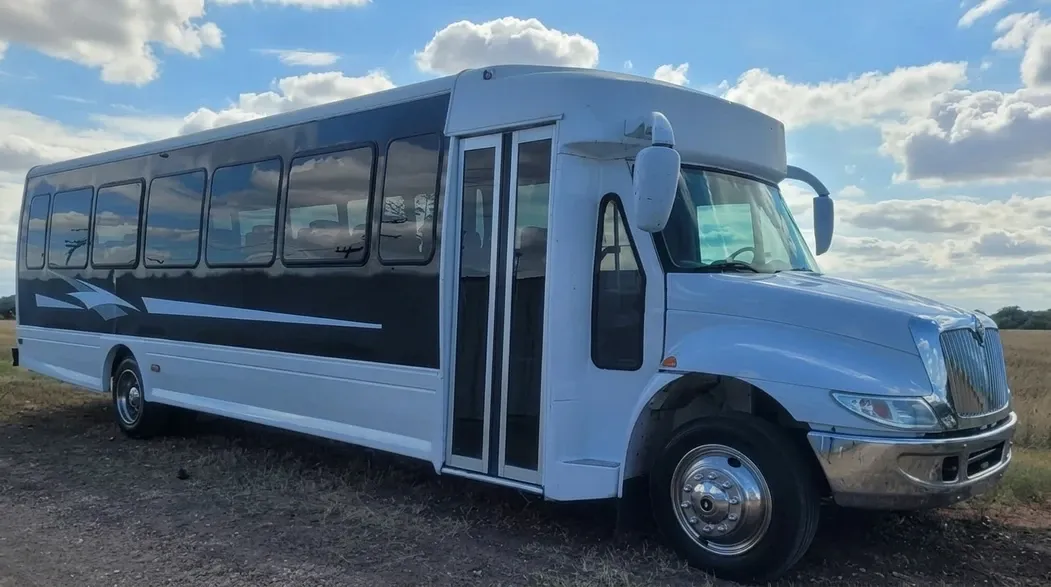 White 27 Passenger Executive Shuttle Bus 27 Passenger Executive Shuttle Bus in white, available to rent