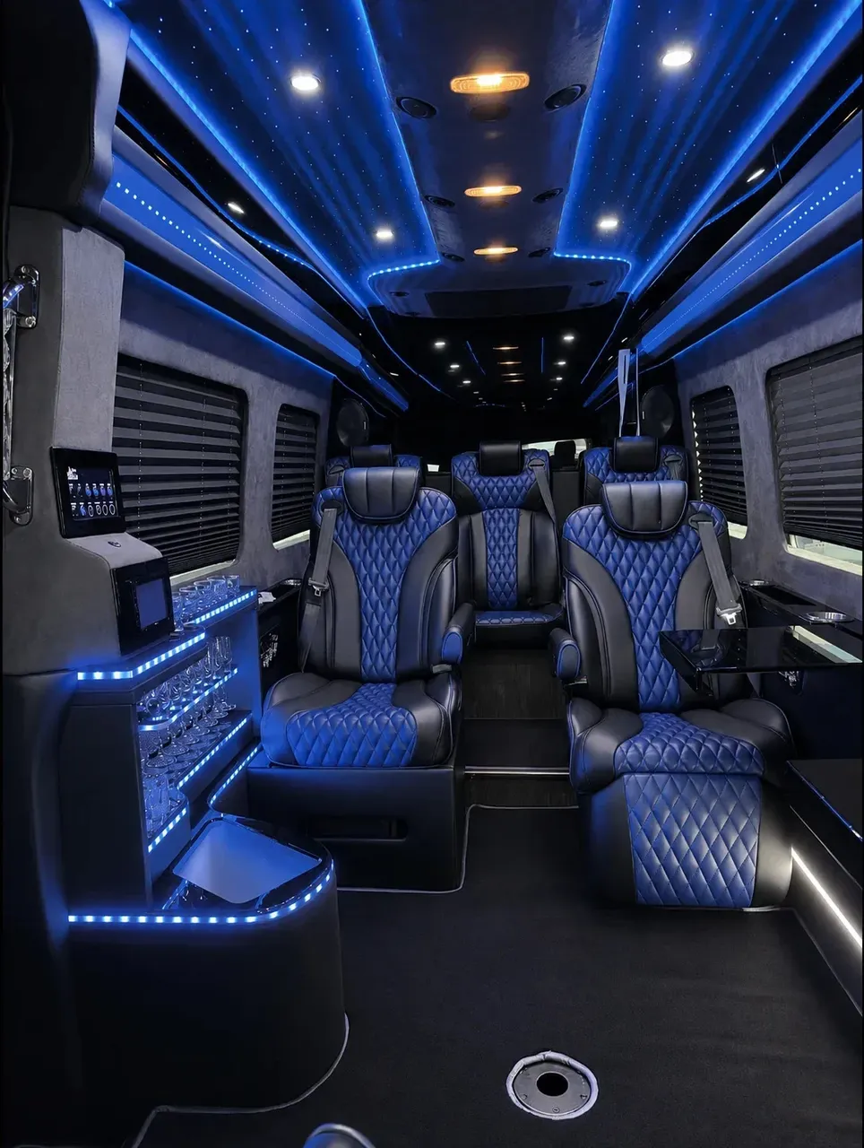 8 Passenger Executive Sprinter Shuttle Van interior with captain's chairs, window shades and LED accent lighting, photo 3 for minibus rental