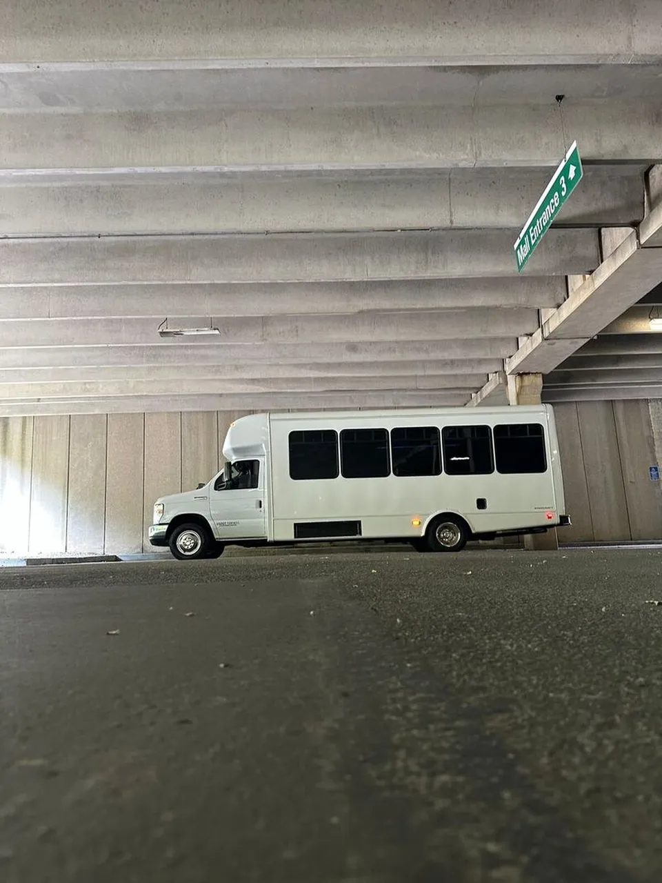 White Ford E-450 Series Party Bus exterior for party bus rental