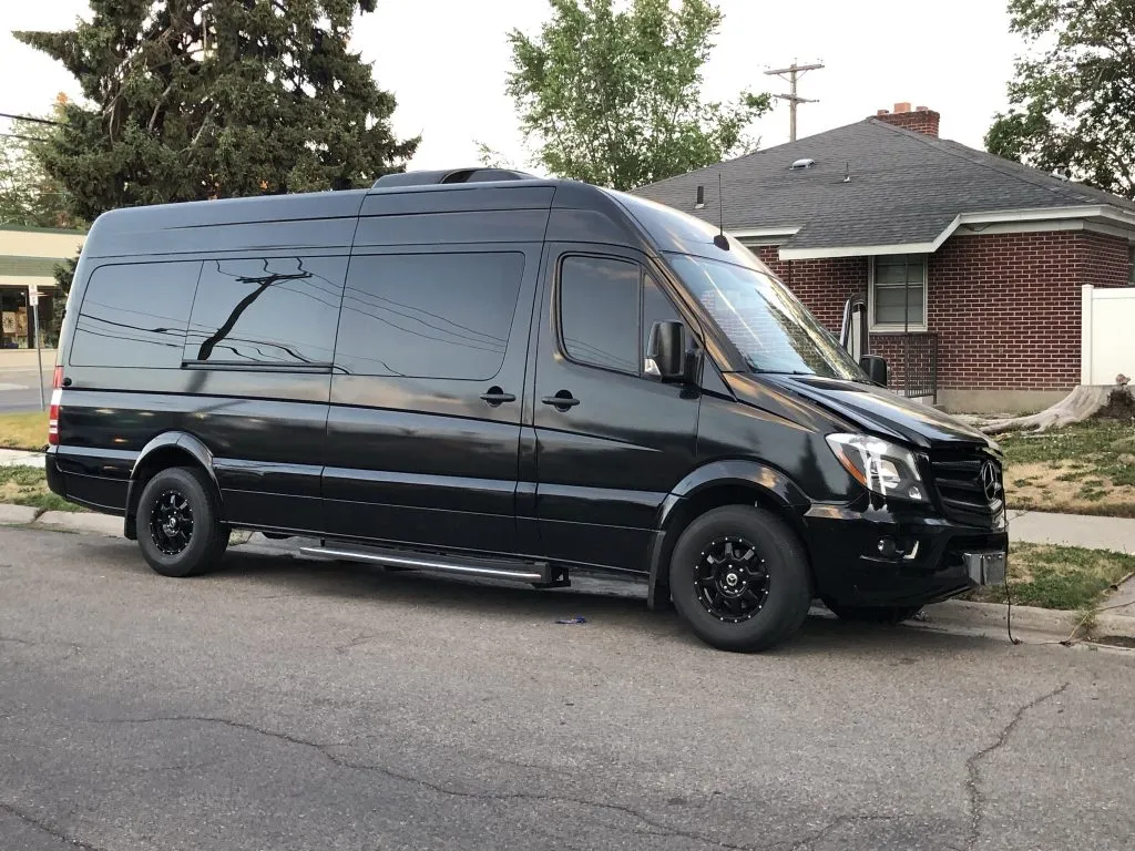 Black Ford Transit Executive Passenger Van for minibus rental