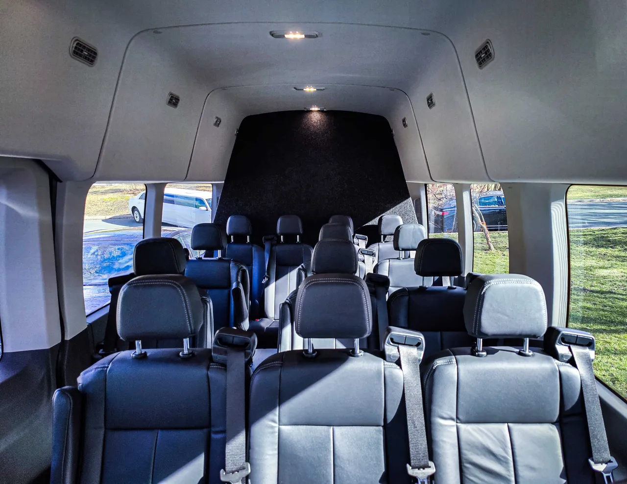 Ford Transit Executive Shuttle Ford Transit Executive Shuttle interior with high-roof cabin for minibus rental