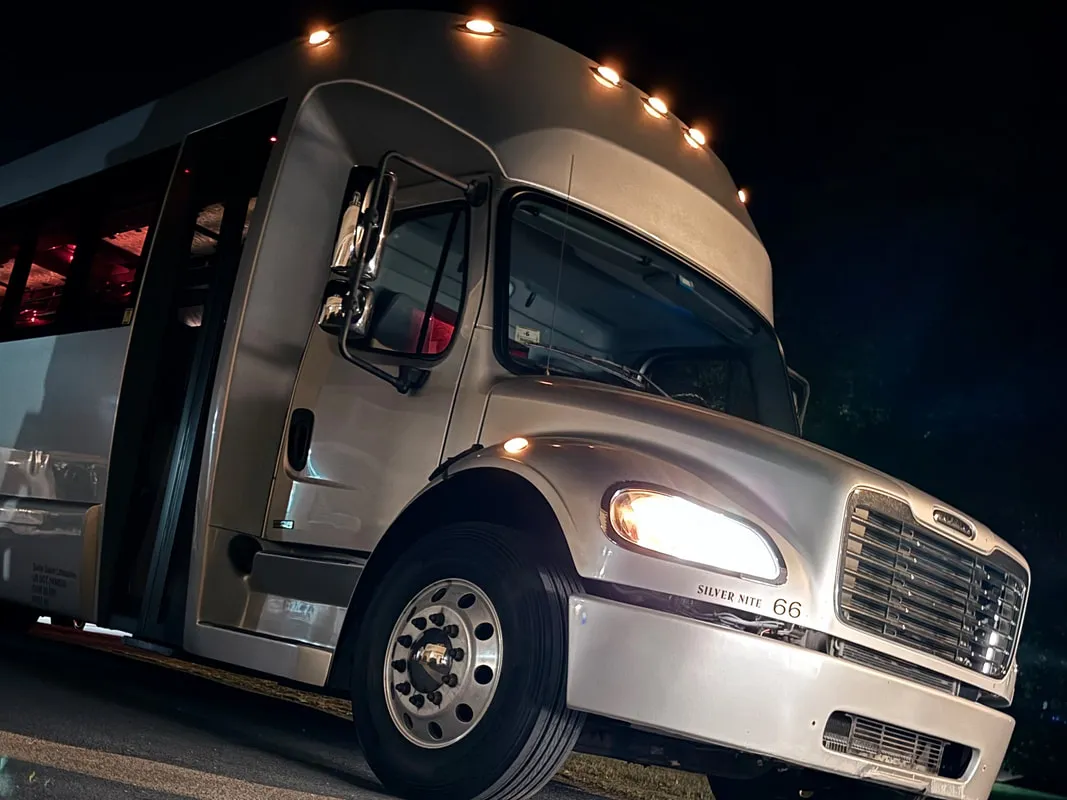 Silver Freightliner Party Bus exterior, photo 4 for party bus rental
