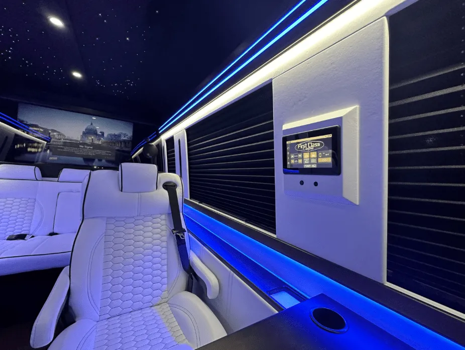 Luxury Mercedes-Benz Sprinter interior with captain's chairs, window shades and LED accent lighting, photo 4 for minibus rental