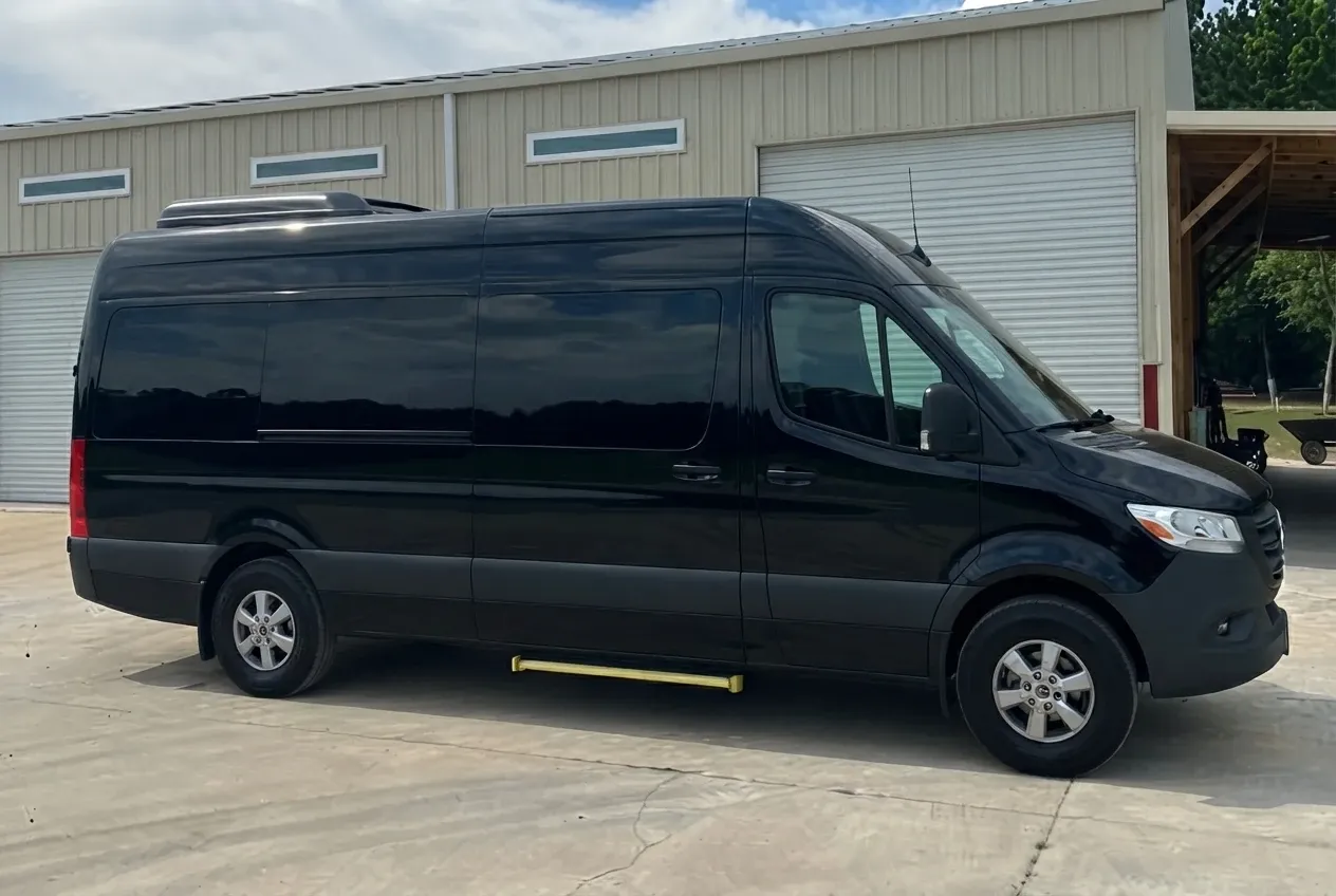 Mercedes-Benz Sprinter Shuttle Van in black, available to rent