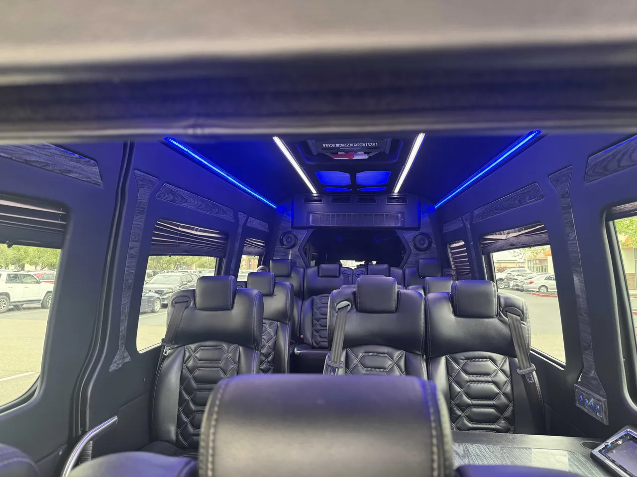 Mercedes Executive Sprinter interior with LED accent lighting and LED ceiling lighting for minibus rental