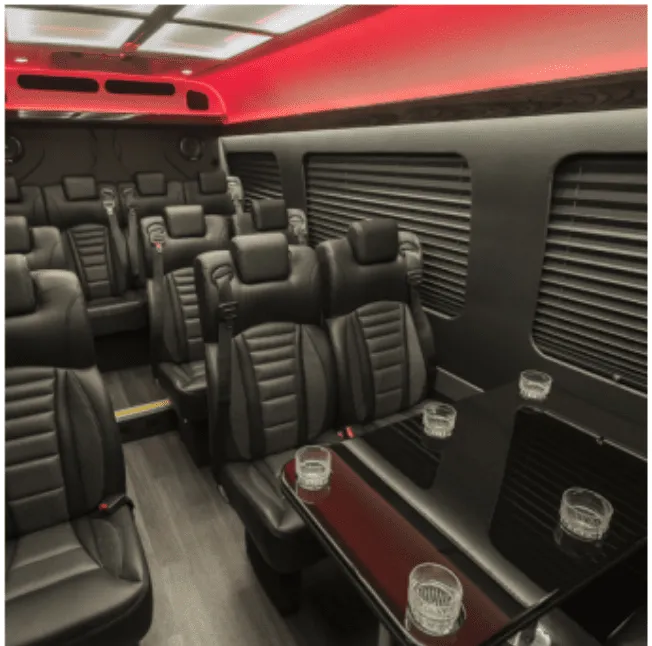 Mercedes Executive Sprinter interior with captain's chairs, passenger tables and window shades, photo 3 for minibus rental