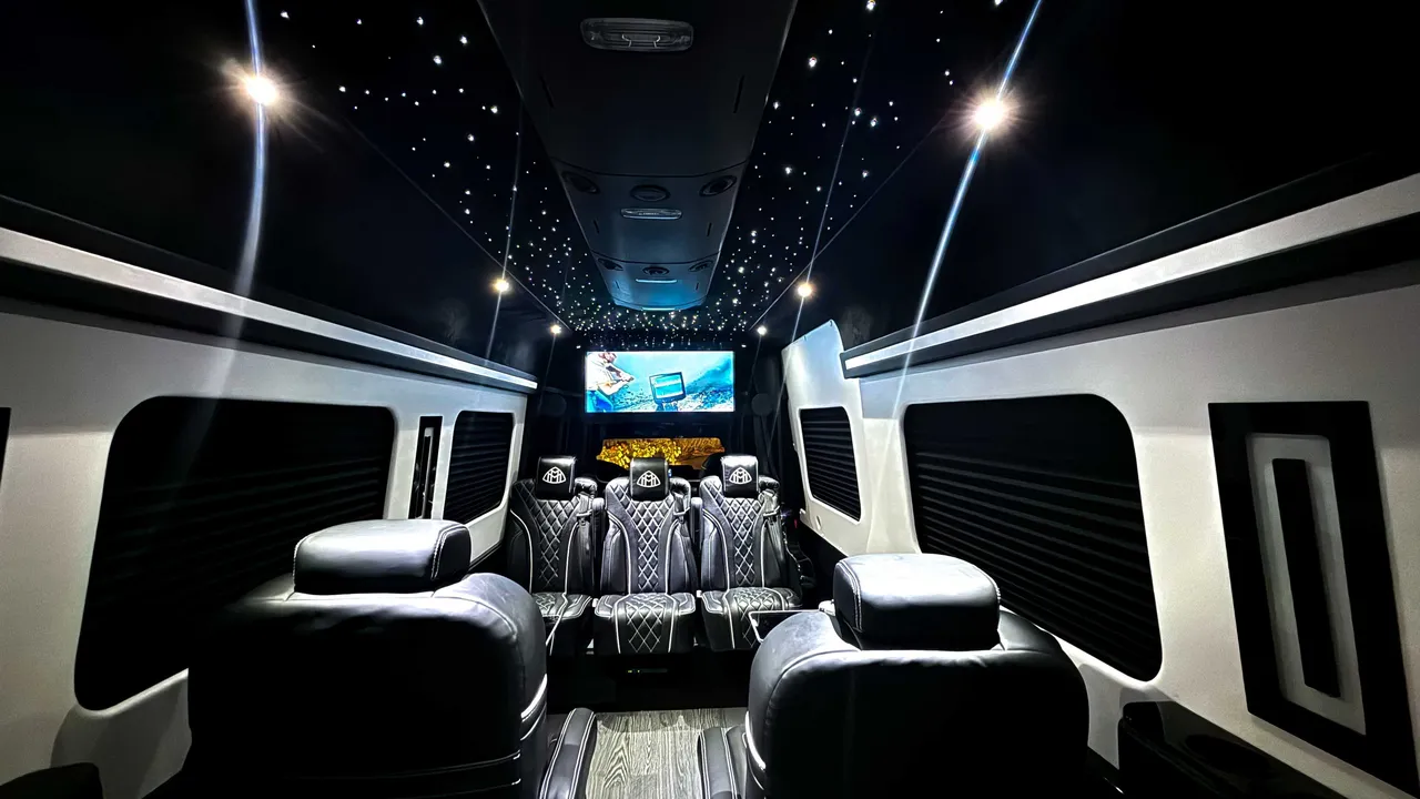 Mercedes-Benz Jet Sprinter Limousine interior with captain's chairs, starlight or fiber-optic ceiling and TV screens for minibus rental