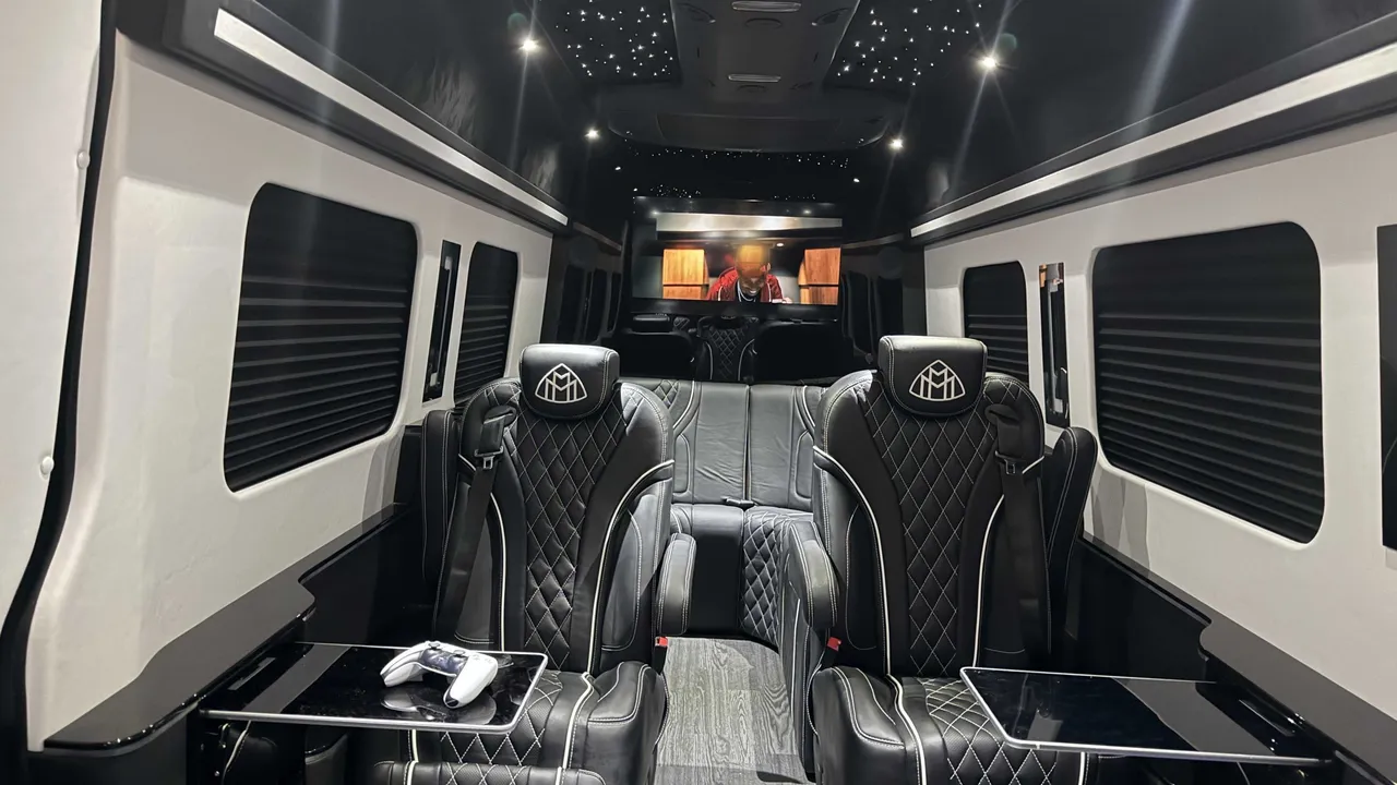 Mercedes-Benz Jet Sprinter Limousine Mercedes-Benz Jet Sprinter Limousine interior with captain's chairs, passenger tables and starlight or fiber-optic ceiling for minibus rental