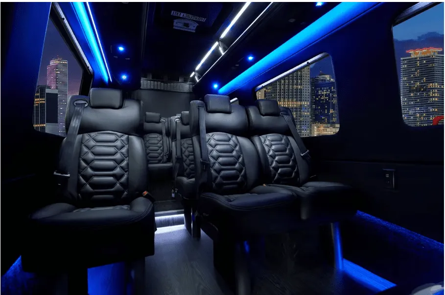 Mercedes-Benz Sprinter interior with captain's chairs, LED accent lighting and LED ceiling lighting for minibus rental