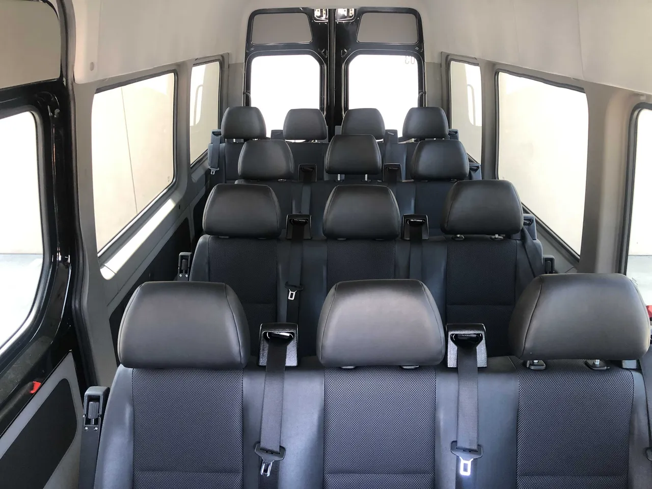 Mercedes-Benz Sprinter Mercedes-Benz Sprinter interior with passenger seat belts for minibus rental