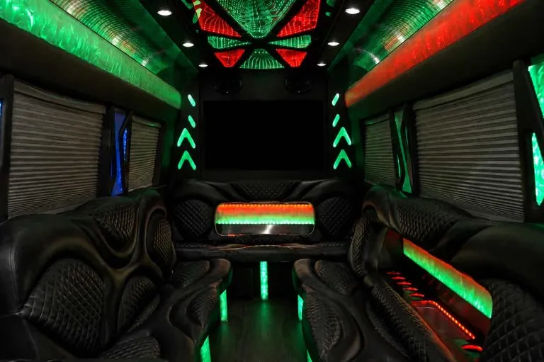 Mercedes-Benz Sprinter Limousine interior with perimeter lounge seating, window shades and LED accent lighting, photo 2 for party bus rental