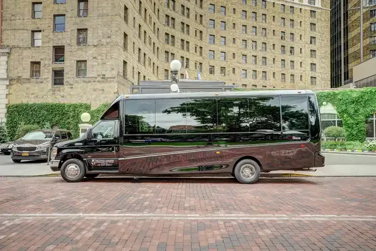 23 Passenger Mini Coach Black 23 Passenger Mini Coach with tinted windows for minibus rental