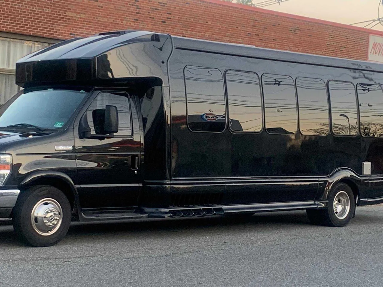 24 Passenger Mini Coach Black 24 Passenger Mini Coach with tinted windows for minibus rental