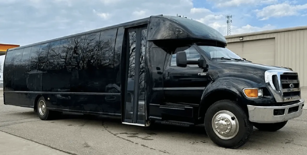 30 Passenger Mini Coach Black 30 Passenger Mini Coach with tinted windows for minibus rental