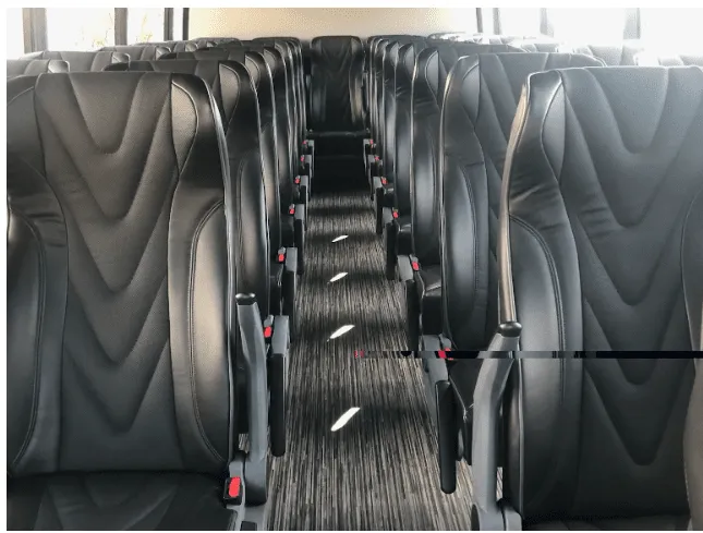 35 Passenger Mini Coach 35 Passenger Mini Coach interior with airline-style seats for minibus rental