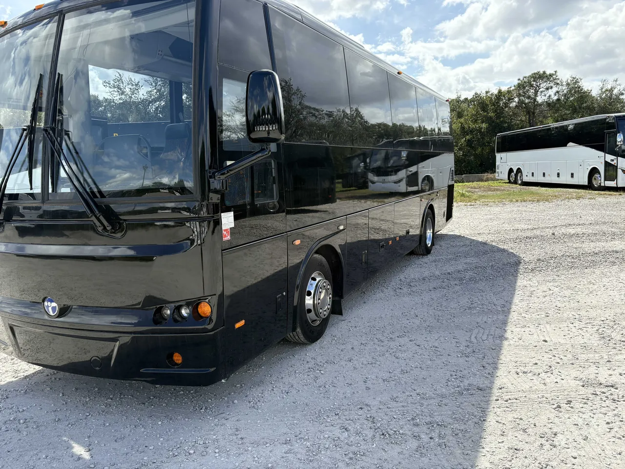 24 Passenger Mini Coach Black 24 Passenger Mini Coach with tinted windows for minibus rental
