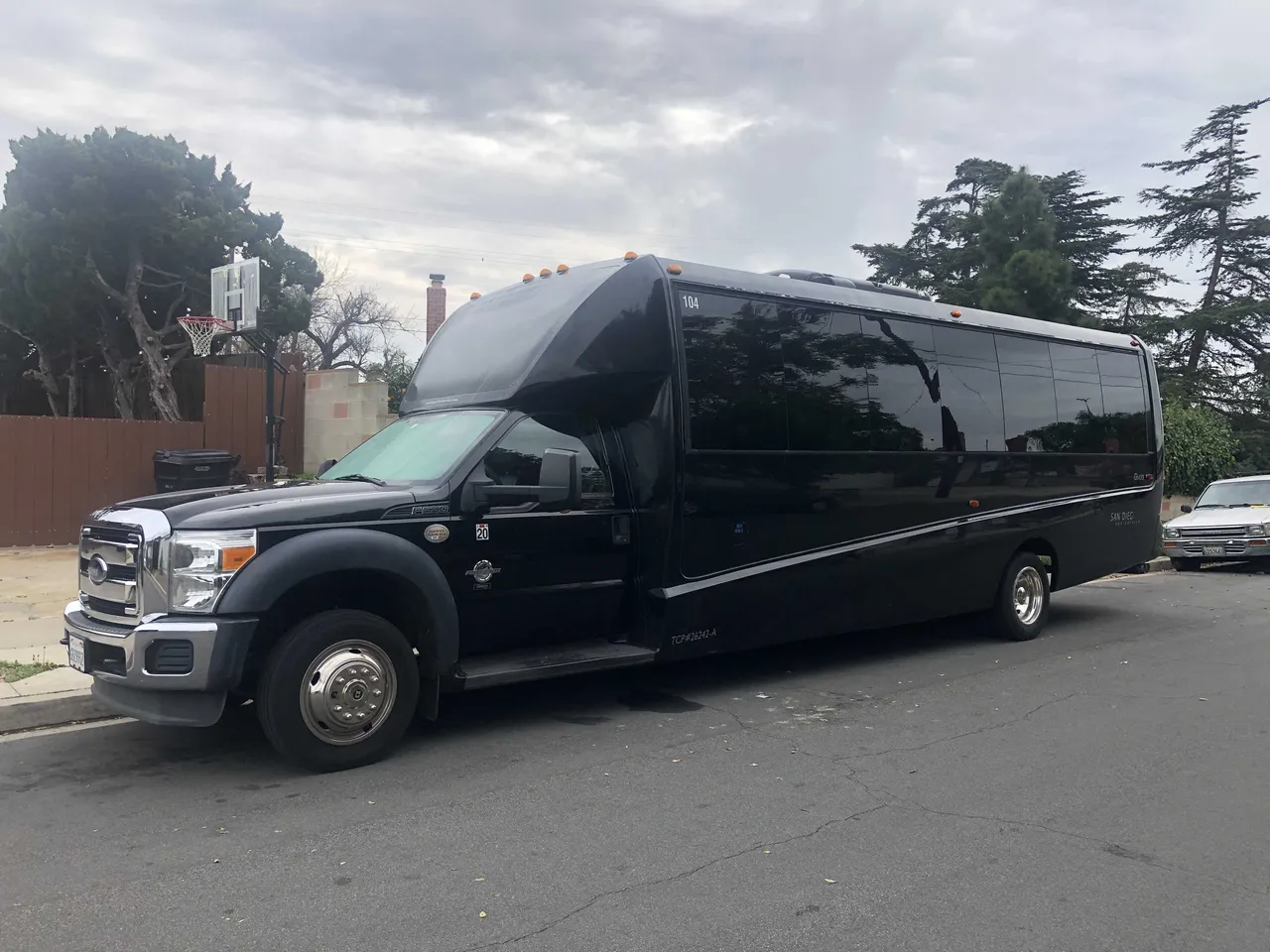 21 Passenger Mini Coach Black 21 Passenger Mini Coach with tinted windows for minibus rental