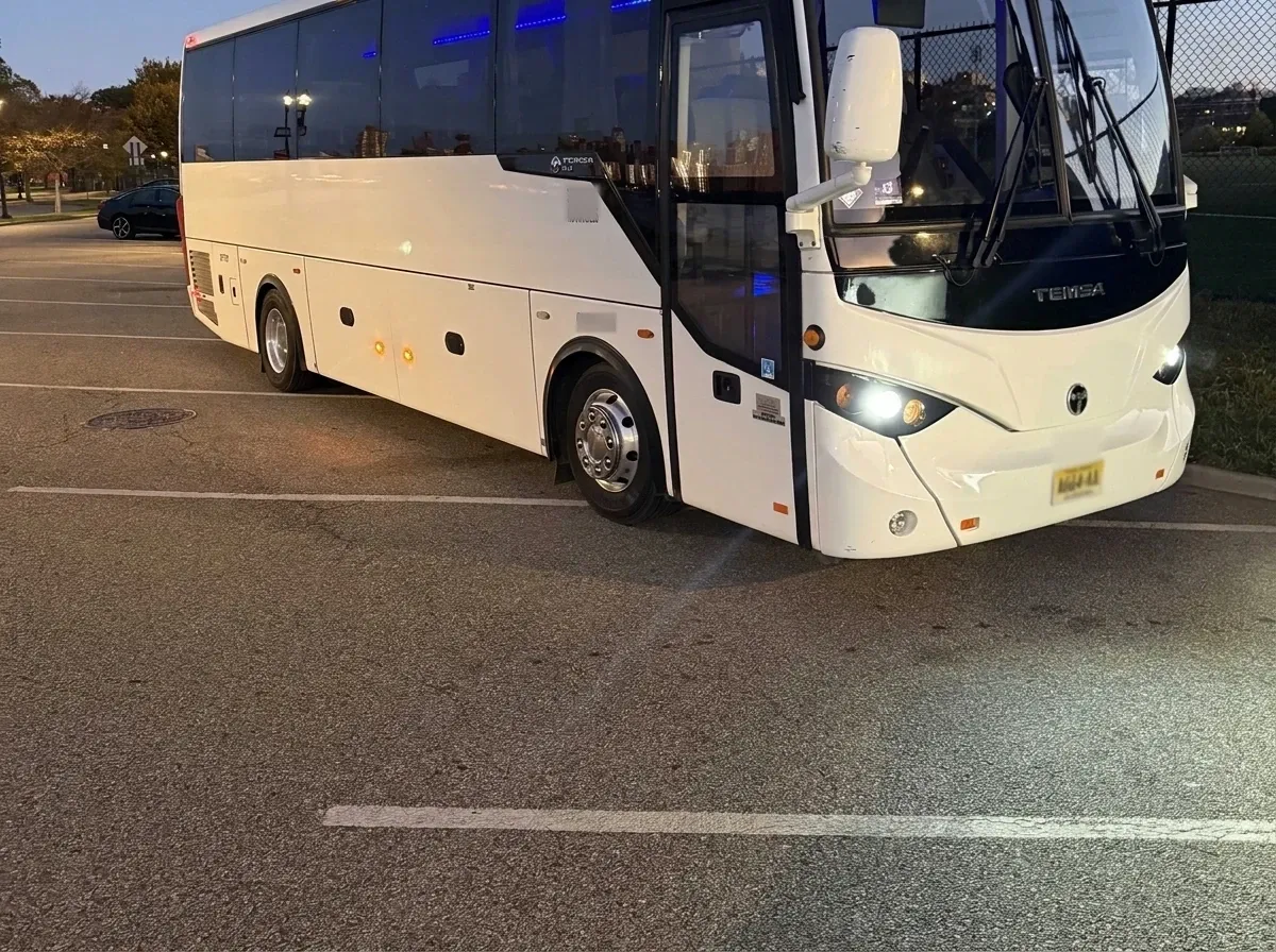 White 36 Passenger Mini Coach 36 Passenger Mini Coach in white, available to rent