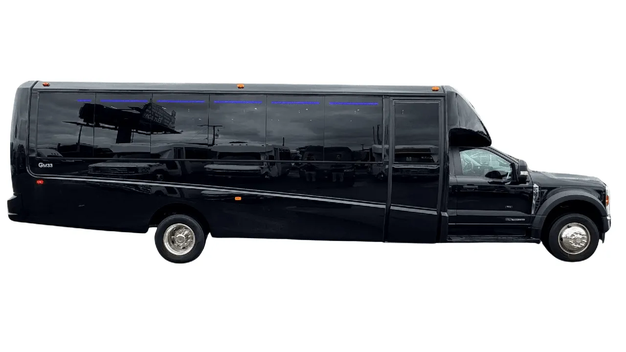 28 Passenger Mini Coach in black, available to rent