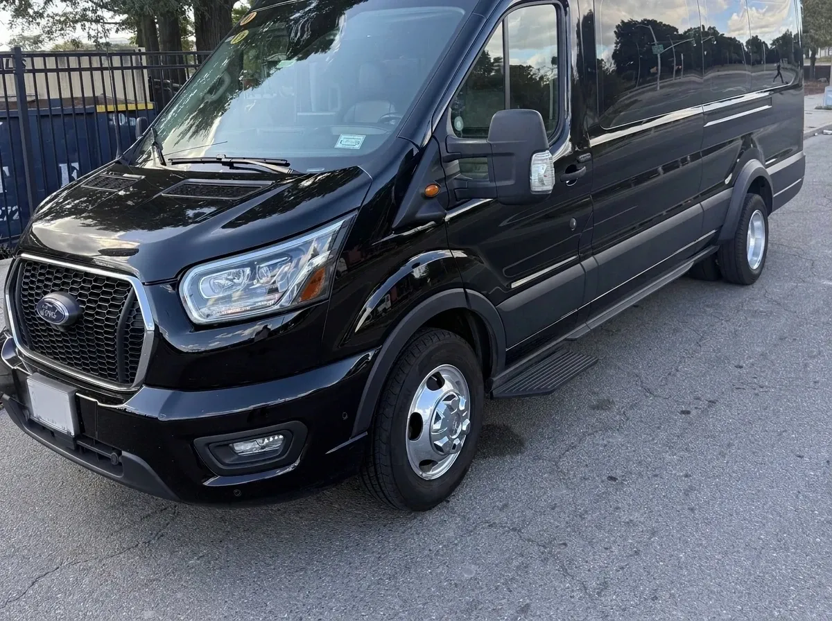 Black 14 Passenger Mini Van 14 Passenger Mini Van in black, available to rent