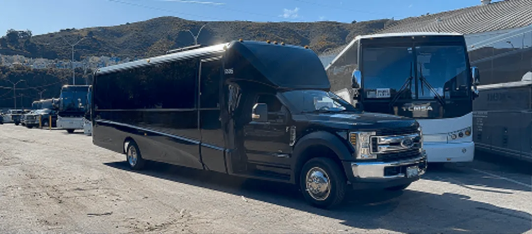 Black 24 Passenger Minibus with tinted windows for minibus rental