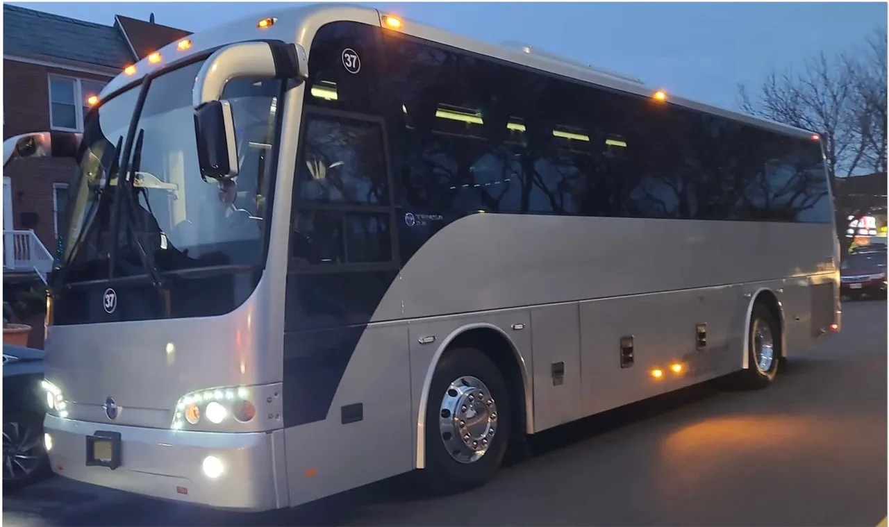 45 Passenger Motor Coach in black, available to rent