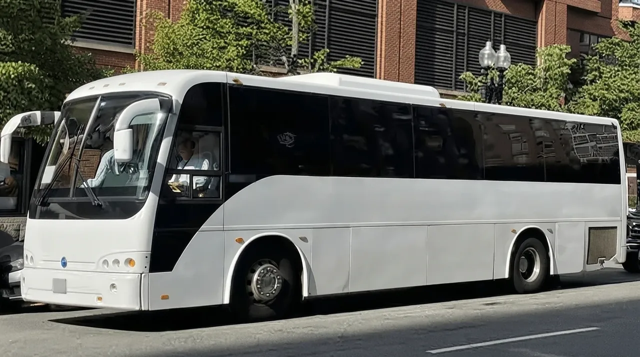 40 Passenger Motor Coach in white, available to rent