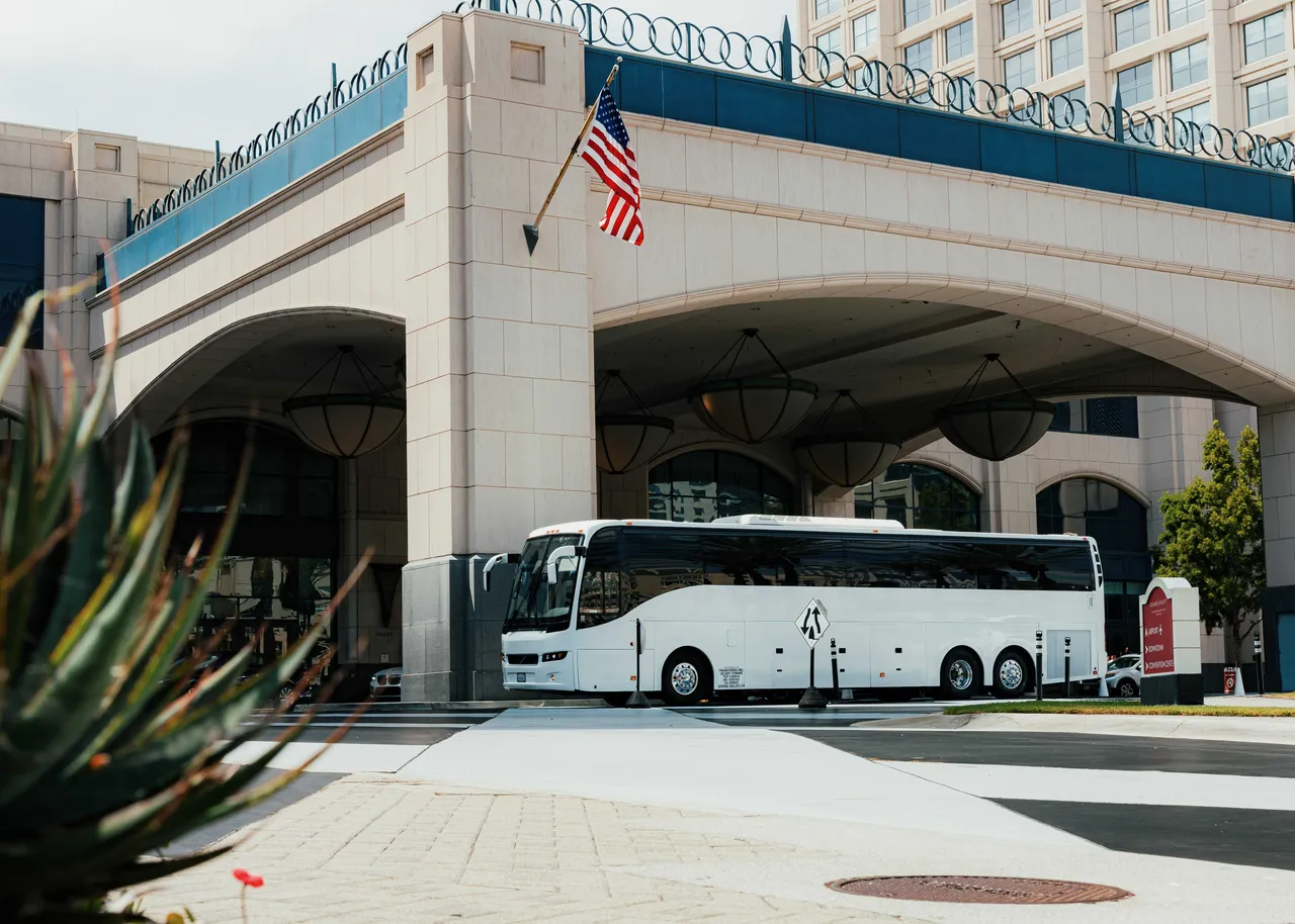 White 56 Passenger Motor Coach for charter bus rental