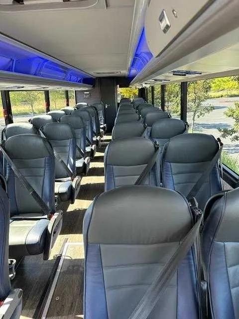 36 Passenger Motorcoach – seating, LED accent lighting and overhead parcel racks