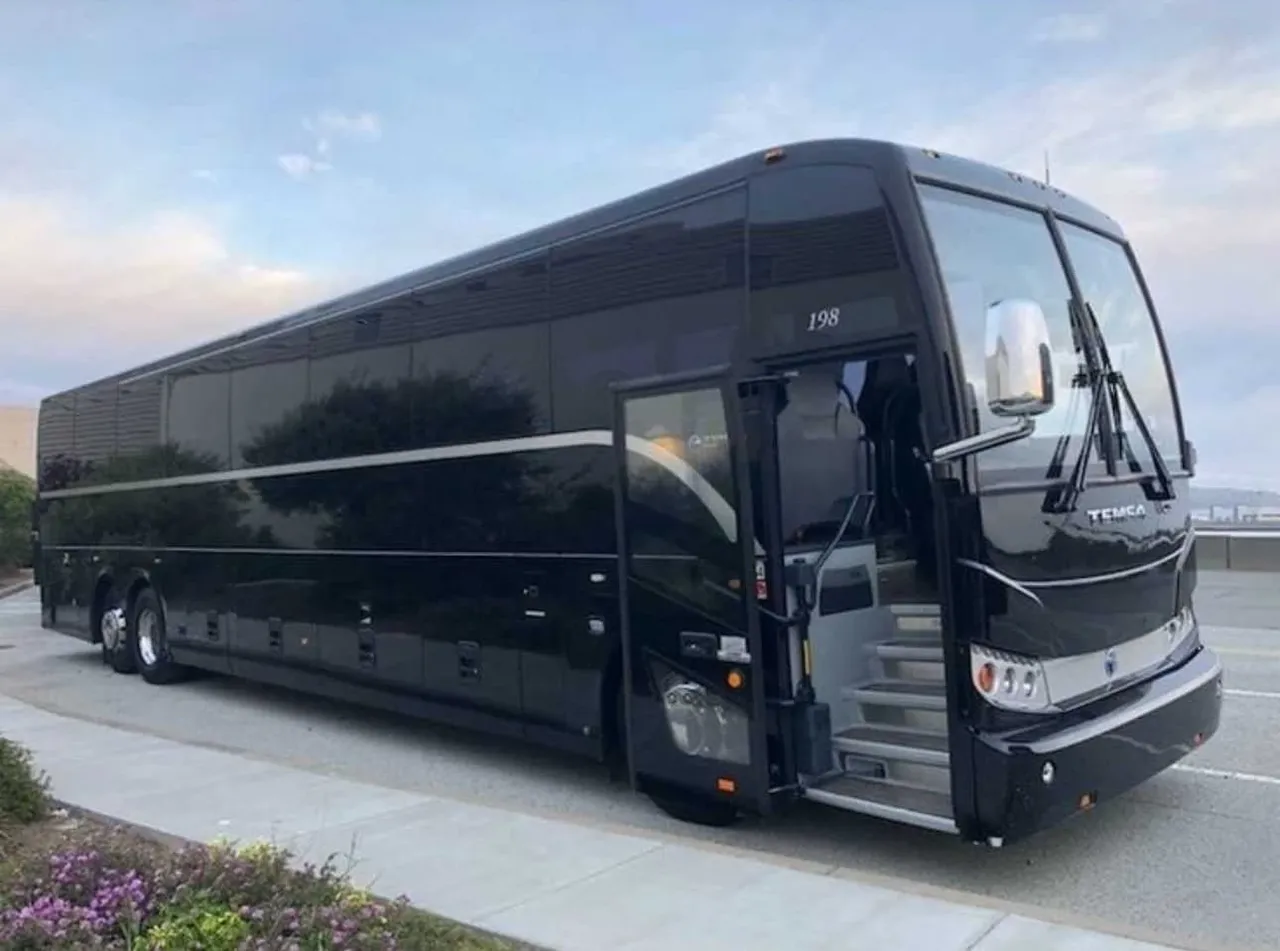 56 Passenger Motorcoach in black, available to rent