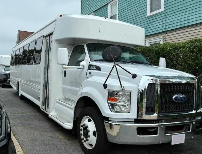 36 Passenger Party Bus in black, available to rent