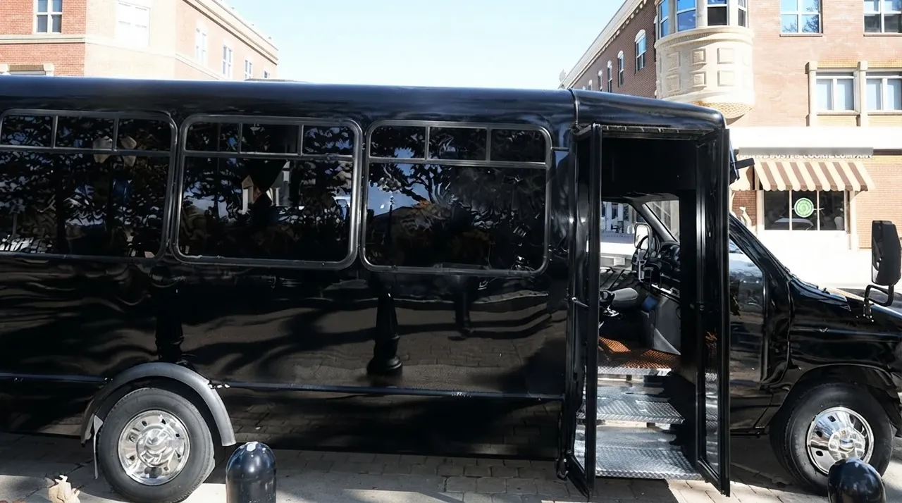 18 Passenger Party Bus in black, available to rent