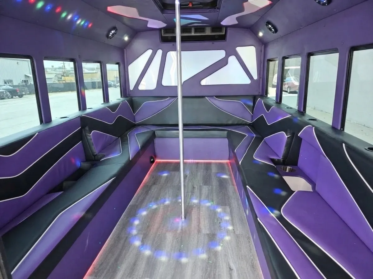 White Purpleline Party Bus Purpleline Party Bus in white, available to rent