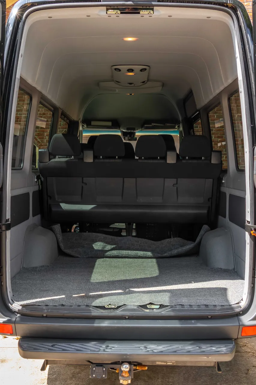 11 Passenger Sprinter interior with rear luggage area for minibus rental