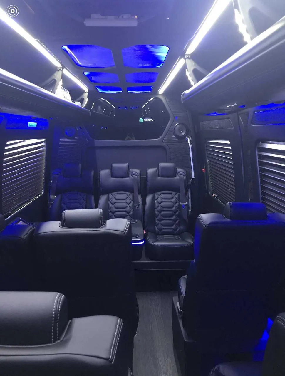 Sprinter VIP Van interior with captain's chairs, window shades and LED accent lighting, photo 3 for minibus rental