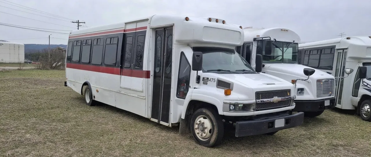 The Red Line Party Bus in white, available to rent