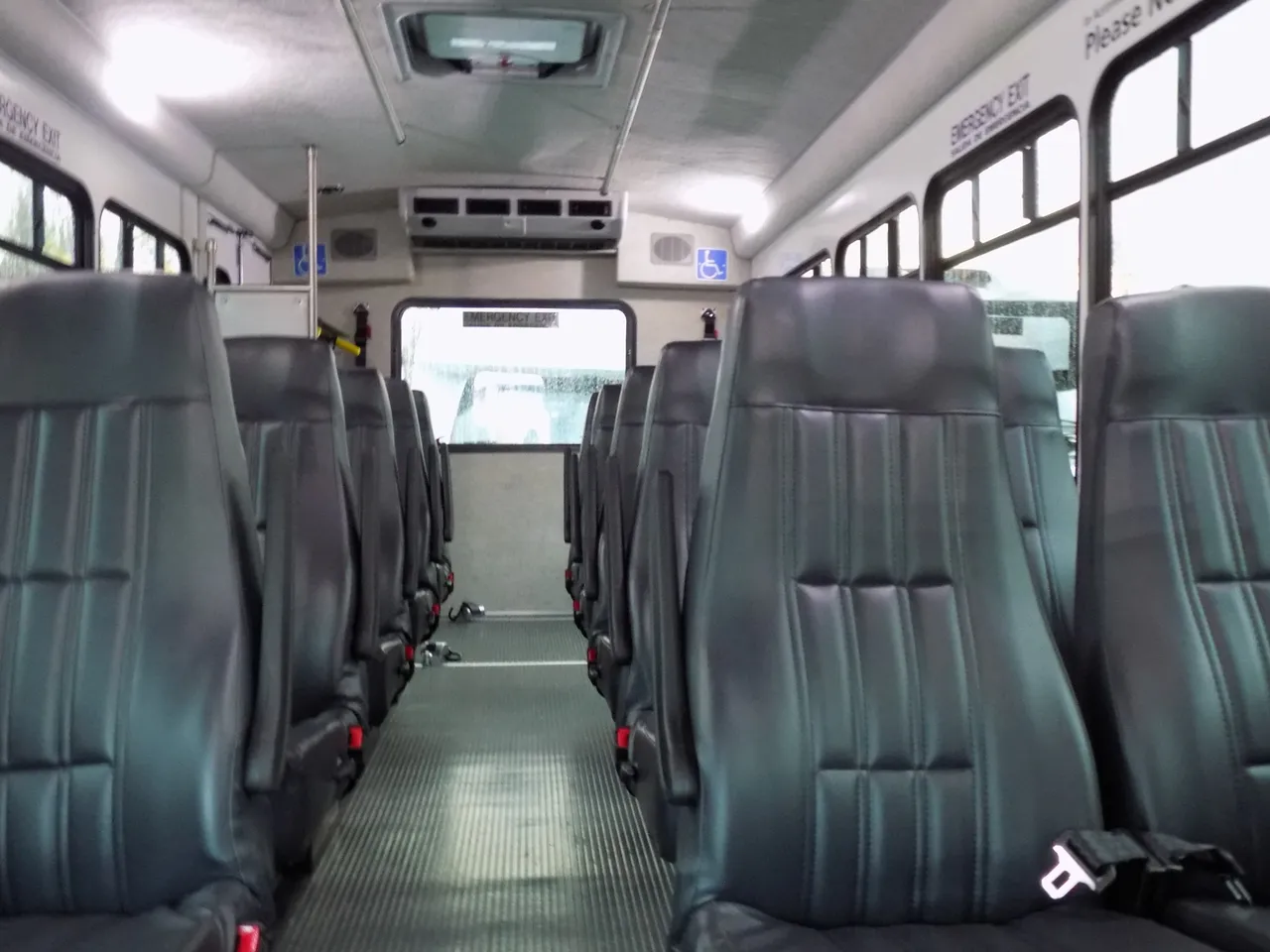 VIP Executive ADA Mini Coach with Wheelchair Lift interior with passenger seat belts, photo 4 for minibus rental