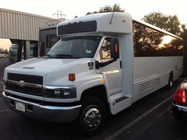 White Chevrolet Shuttle Bus White Chevrolet Shuttle Bus for minibus rental